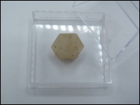 Hexagonal dipyramid quartz crystal middle in box